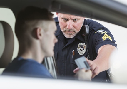 Police officer asking for ID